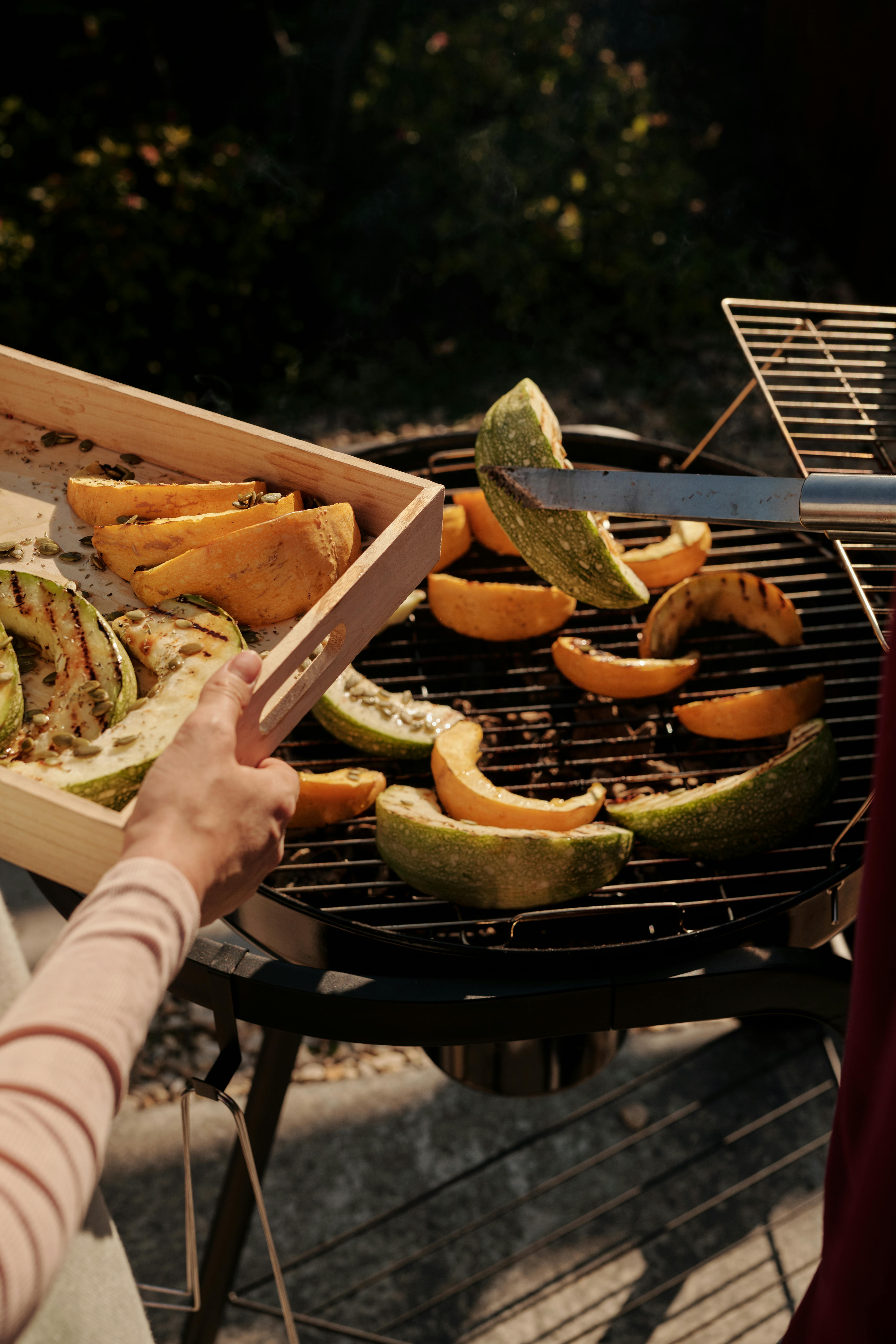 Grilling food outdoors